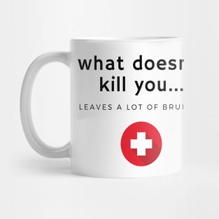 What doesn't kill you... bruises Mug